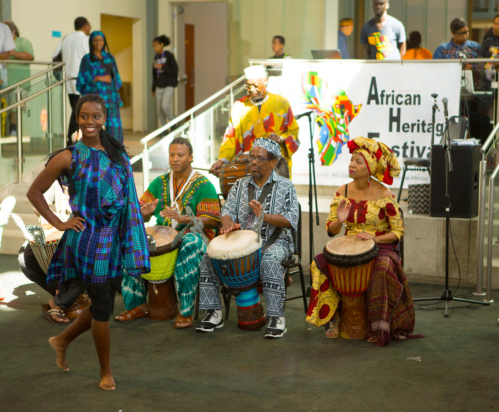 Dancer with live musicians at African Heritage festival